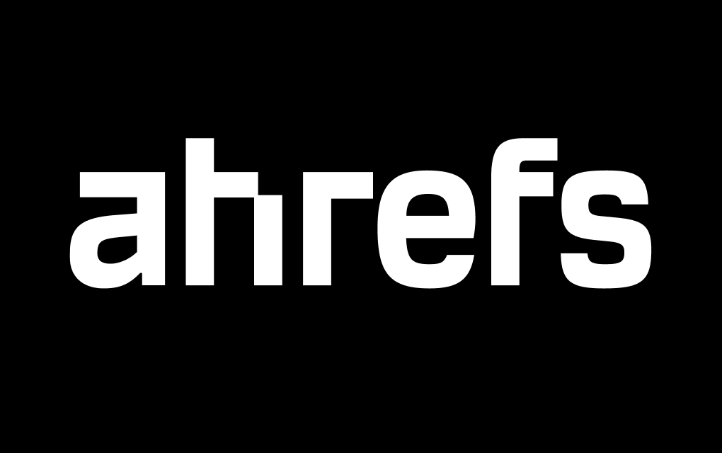 Monochrome Ahrefs logo on dark background